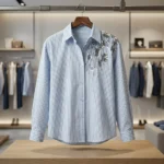 Elegant light blue and white vertical pinstripe women's formal shirt featuring premium silver sequin floral embroidery on the left shoulder (2)