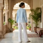 Elegant sky blue vintage style women's blouse featuring a white lace Peter Pan collar and embroidered geometric patterns (3)