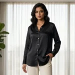 Elegant woman wearing a black satin full sleeve shirt with white buttons (2)