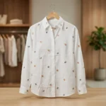 Elegant women's white long sleeve shirt with scattered multicolor floral embroidery and button down front (2)
