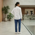 Elegant women's white long sleeve shirt with scattered multicolor floral embroidery and button down front (4)