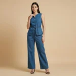 Premium blue denim co ord set for women featuring a sleeveless button down waistcoat and wide leg trousers (1)