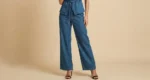 Premium blue denim co ord set for women featuring a sleeveless button down waistcoat and wide leg trousers (4)