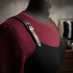 Women’s burgundy and black two tone color block top with faux leather buckle straps (3)