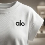 Women's white boxy fit crew neck top featuring extended cap sleeves and a minimalist logo (4)