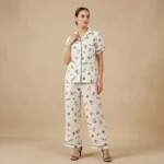 A premium off white Hello Kitty and cupcake print night suit with black piping and notched collar (2)