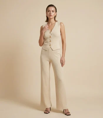 A sophisticated women's beige ribbed co ord set featuring a button down sleeveless vest and matching wide leg trousers (6)