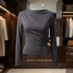 A woman wearing a charcoal grey full sleeves top with a draped neckline (1)