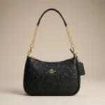 Coach Nolita 19 black signature debossed leather bag with gold chain strap (2)