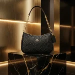 Coach Nolita 19 black signature debossed leather bag with gold chain strap (3)