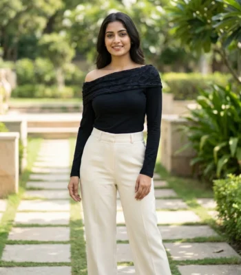 Elegant black long sleeve women's top with asymmetric floral lace neckline detail (2)