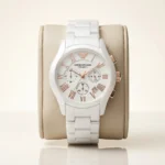 Emporio Armani AR 1478 Ceramica white watch with rose gold roman numerals on a premium display cushion (1)