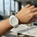 Emporio Armani AR 1478 Ceramica white watch with rose gold roman numerals on a premium display cushion (2)