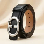 Front view of a men's black leather belt with a polished silver interlocking monogram buckle (4)