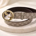 Gucci Blondie GG Supreme beige and ebony canvas belt with gold toned interlocking G logo buckle for women (1)