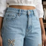 Light Blue Wide Leg High Waisted Denim Jeans with Rhinestone Bow Embellishments (3)