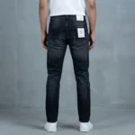 Louis Vuitton Men’s Slim Fit Dark Wash Denim Jeans with Studded LV Logo Detail (2)