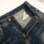 Men’s dark blue baggy fit vintage wash raw denim jeans with paneled stitching (5)