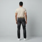 Men's dark wash slim fit indigo denim jeans with khaki webbed belt and white sneakers (2)