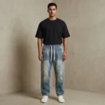 Men's light wash paneled baggy jogger jeans with white drawstring and elastic waistband (5)