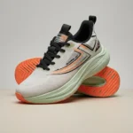 Men's lightweight breathable running shoes in mint green and white with orange accents (3)