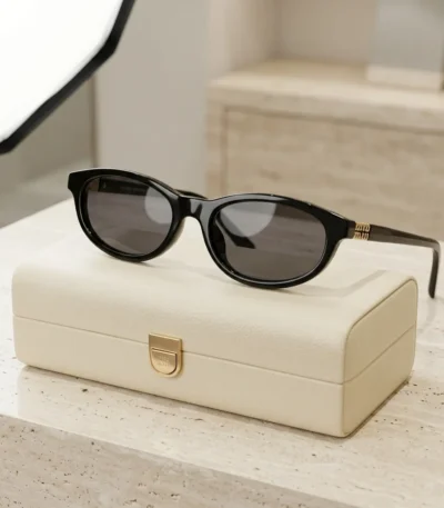 Miu Miu Black Oval Sunglasses for Women with Gold Logo Hinges (4)
