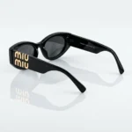Miu Miu Black Oval Sunglasses with Gold Logo for Women (1)