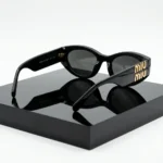 Miu Miu Black Oval Sunglasses with Gold Logo for Women (6)