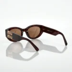 Miu Miu Glimpse dark tortoise shell cat eye sunglasses with gold logo hardware and cream leather case (4)