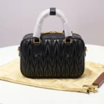 Miu Miu Matelassé black nappa leather top handle bag with gold logo and padlock (5)