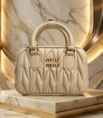 Miu Miu Wander Matelassé nappa leather mini bag in cream with gold logo (1)