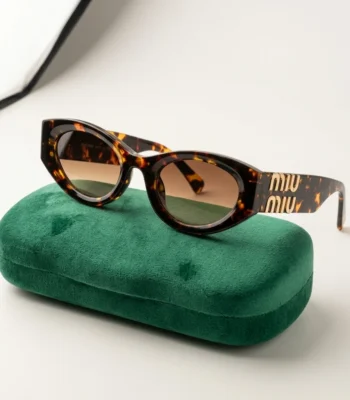 Miu Miu dark havana tortoiseshell oval sunglasses with gold logo hardware and green velvet case (1)
