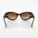 Miu Miu dark havana tortoiseshell oval sunglasses with gold logo hardware and green velvet case (2)