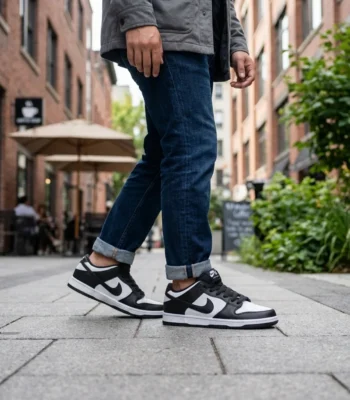 Nike SB Dunk Low Black and White Panda Sneakers on Marble Display (1)