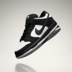 Nike SB Dunk Low Black and White Panda Sneakers on Marble Display (2)