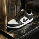 Nike SB Dunk Low Black and White Panda Sneakers on Marble Display (5)