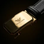 Premium Giorgio Armani men's black leather belt featuring a polished gold automatic buckle and embossed eagle logo (2)