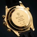 Rolex Cosmograph Daytona Eye of the Tiger 18k yellow gold watch with diamond paved tiger print dial and black Oysterflex strap (4)