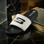 Skechers Hyper Burst Recovery slides in black and white featuring Goodyear rubber outsole and contoured footbed (3)