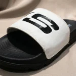 Skechers Hyper Burst Recovery slides in black and white featuring Goodyear rubber outsole and contoured footbed (6)