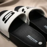 Skechers Hyper Burst Recovery slides in black and white featuring Goodyear rubber outsole and contoured footbed (7)