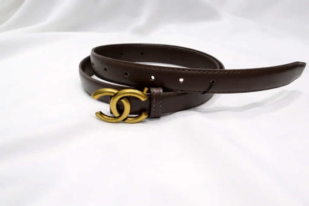 Slim brown leather women's belt with antique gold CC interlocking buckle (1)