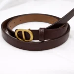 Slim dark brown leather belt for women featuring a matte gold oval CD buckle (1)