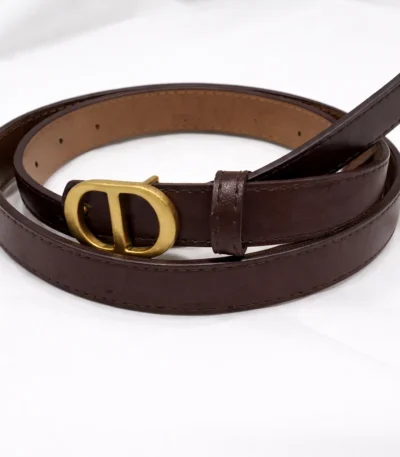 Slim dark brown leather belt for women featuring a matte gold oval CD buckle (1)
