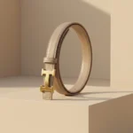 Slim taupe leather women's belt with gold H motif buckle, premium fashion accessory (6)