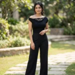 Woman wearing a premium black off shoulder top (3)