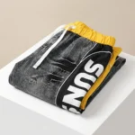 Women's High Waisted Distressed Grey Denim Joggers with Yellow Elastic Waistband and Side Typography Striping (3)