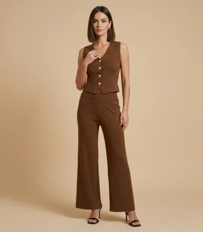 Women's chocolate brown ribbed co ord set featuring a sleeveless V neck vest with gold crest buttons and high waisted wide leg trousers (2)