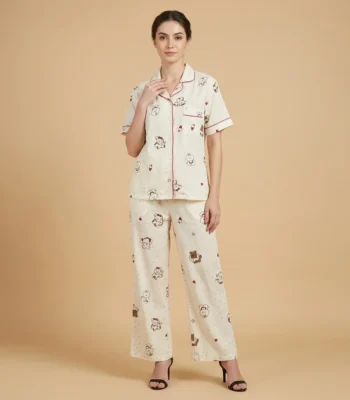 Women’s cream colored notched collar pajama set with whimsical animal print and red piping details (3)
