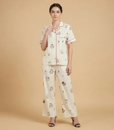Women’s cream colored notched collar pajama set with whimsical animal print and red piping details (3)